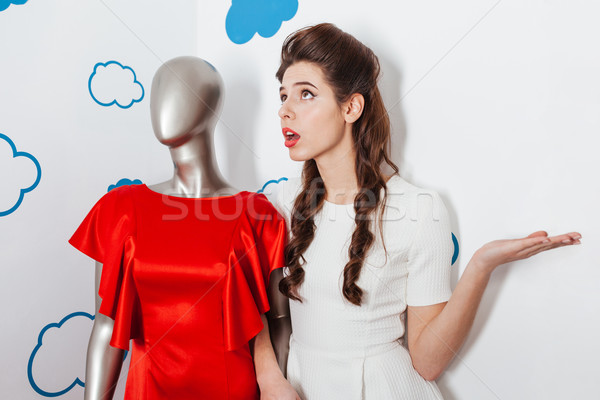 Woman talking with manikin Stock photo © deandrobot