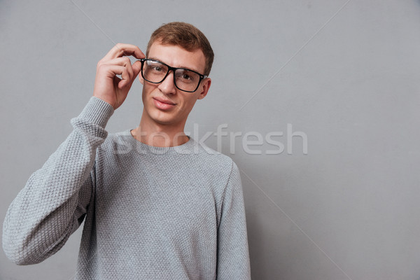 Man in glasses Stock photo © deandrobot