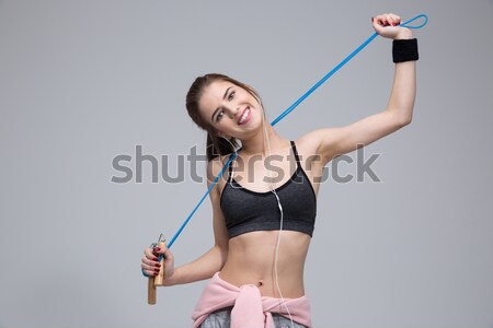 Jovem concentrado mulher da aptidão pequeno retrato isolado Foto stock © deandrobot