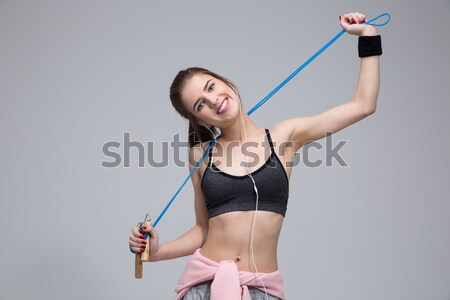 Jeunes concentré femme de remise en forme faible portrait isolé [[stock_photo]] © deandrobot