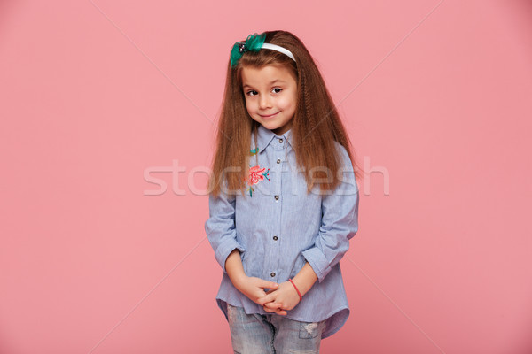 Portrait of cute schoolgirl 5-6 years having long auburn hair lo Stock photo © deandrobot