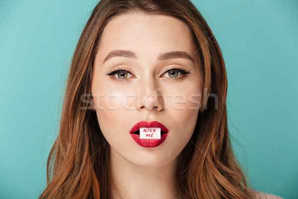 Close up portrait of a relaxed brown haired woman Stock photo © deandrobot