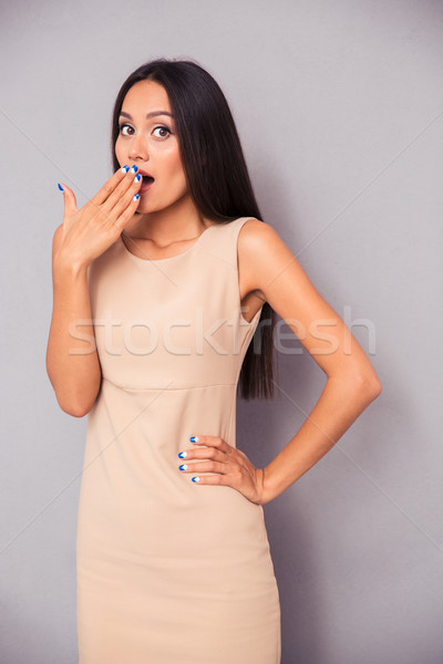 Stock photo: Portrait of a young woman yawning