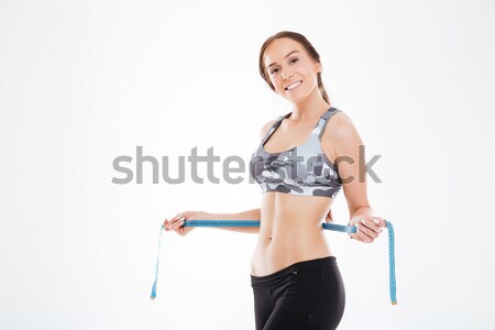 oung sports woman stretching hands  Stock photo © deandrobot