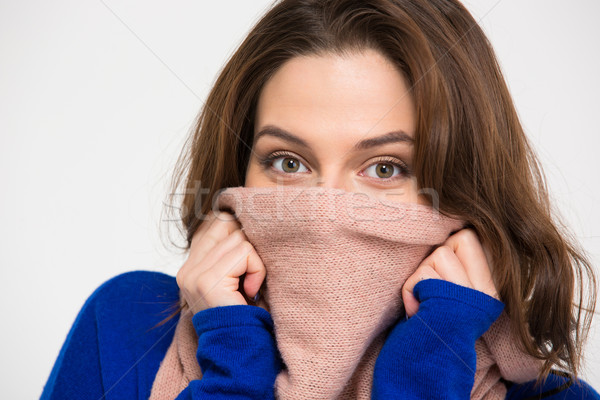 Mooie jonge vrouw gedekt gezicht warm roze Stockfoto © deandrobot