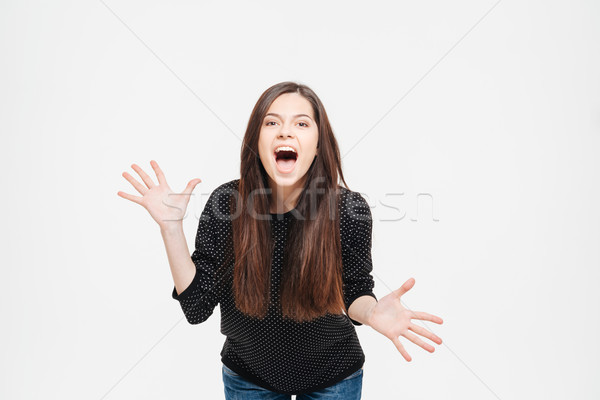 Mulher jovem gritando isolado branco mulher menina Foto stock © deandrobot