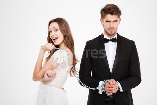 Related groom with happy bride Stock photo © deandrobot