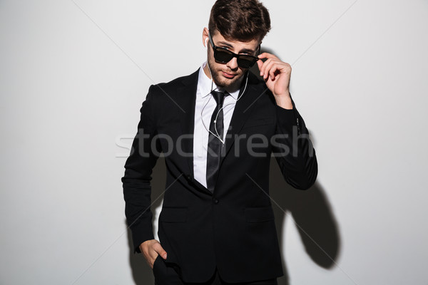 Stock photo: Portrait of a handsome stylish man in suit and tie