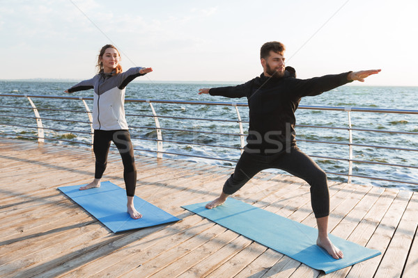 Sağlıklı genç spor çift yoga Stok fotoğraf © deandrobot