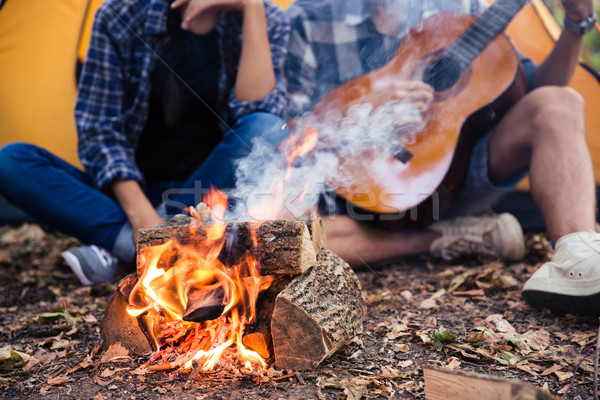 Couple séance guitare feu de joie forêt portrait [[stock_photo]] © deandrobot