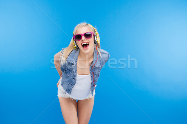 женщины подростку позируют синий Сток-фото © deandrobot