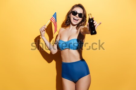 Młodych dopasować kobieta strój kąpielowy stwarzające Zdjęcia stock © deandrobot