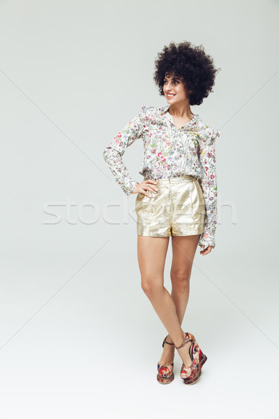 Cheerful retro woman dressed in shirt Stock photo © deandrobot