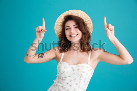 Stock photo: Portrait of a smiling girl dressed in swimsuit