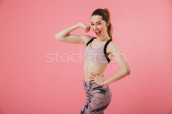 Oldalnézet boldog sportoló pózol kar csípő Stock fotó © deandrobot