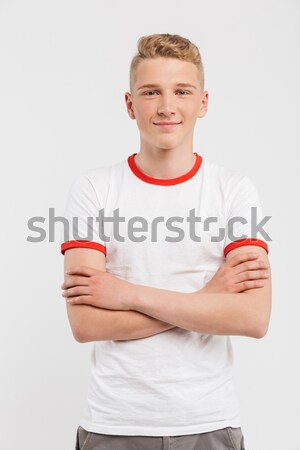 肖像 微笑 十幾歲的男孩 常設 武器 折疊 商業照片 © deandrobot