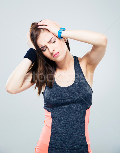 Deportes mujer dolor de cabeza gris cuerpo pelo Foto stock © deandrobot