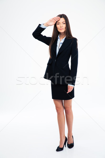 Beautiful businesswoman saluting Stock photo © deandrobot