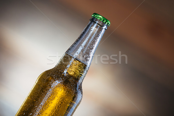 Bottle with beer Stock photo © deandrobot