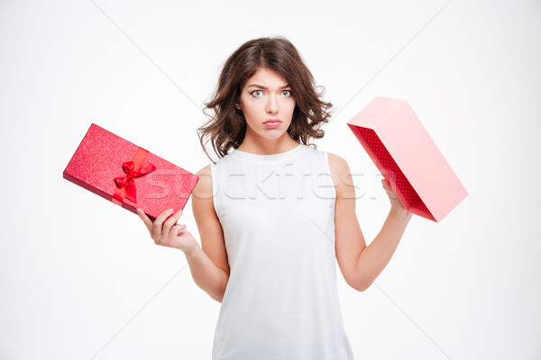 Sad woman holding empty gift box Stock photo © deandrobot
