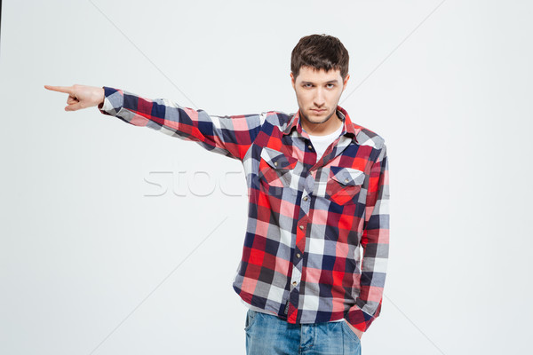 Stock photo: Angry man pointing finger away