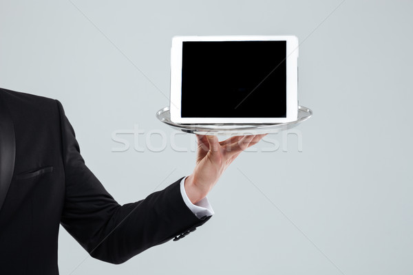 Hand De ober zwart pak scherm tablet Stockfoto © deandrobot