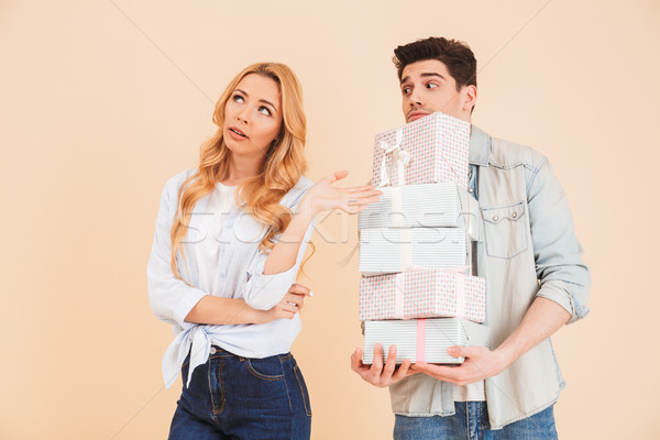 Portrait of naughty upset woman rejecting all present boxes whic Stock photo © deandrobot