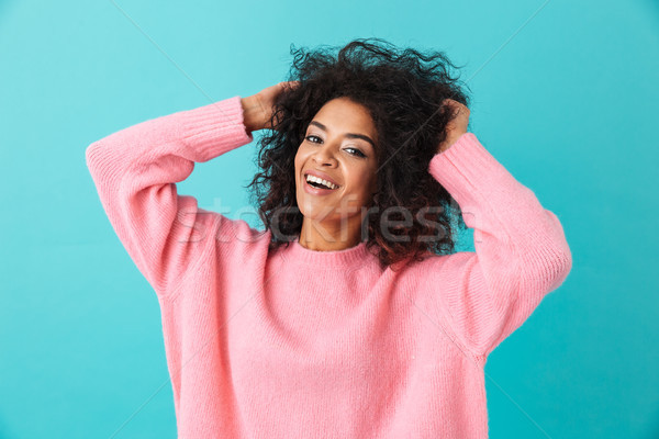 Colorful portrait of smiling woman in pink shirt posing on camer Stock photo © deandrobot