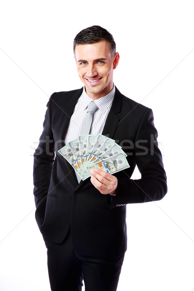 Happy businessman holding US dollars isolated on a white background Stock photo © deandrobot