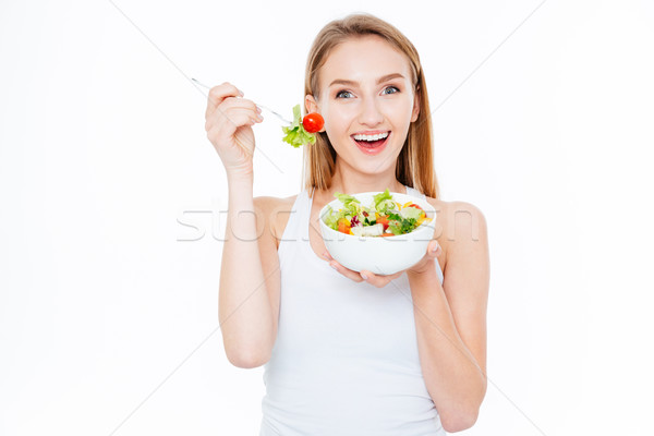 Felice donna mangiare fresche insalata bella donna Foto d'archivio © deandrobot