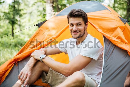 Man tourist with backpack at touristic tent in forest Stock photo © deandrobot