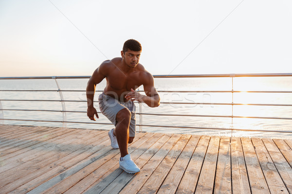 Shirtless african jungen Sportler Pier Stock foto © deandrobot