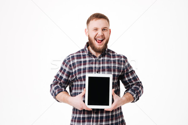 Lachend man shirt tonen scherm Stockfoto © deandrobot