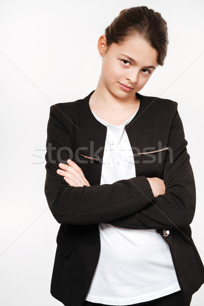Amazing young girl standing with arms crossed Stock photo © deandrobot