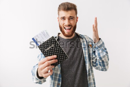 Upset man with dye in hands Stock photo © deandrobot