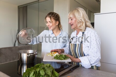 счастливым молодые Lady Домашняя кухня кухне бабушки Сток-фото © deandrobot