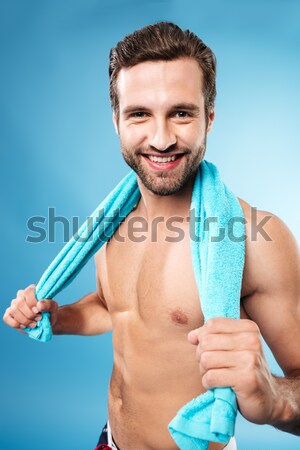 Cheerful happy italian football fan with flag on his body and face, isolated on white Stock photo © deandrobot