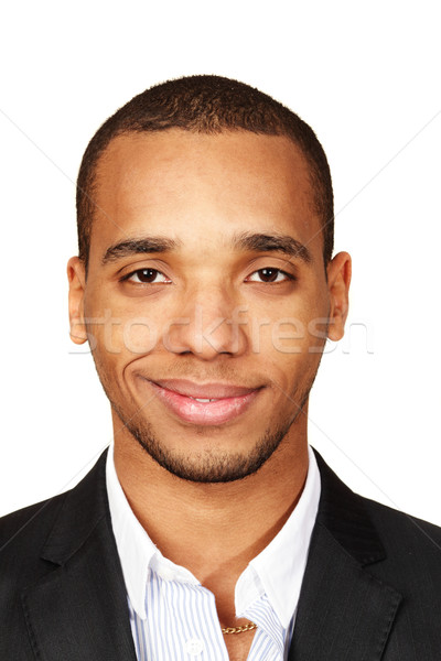Closeup portrait of a young african-american businessman isolated on white background Stock photo © deandrobot