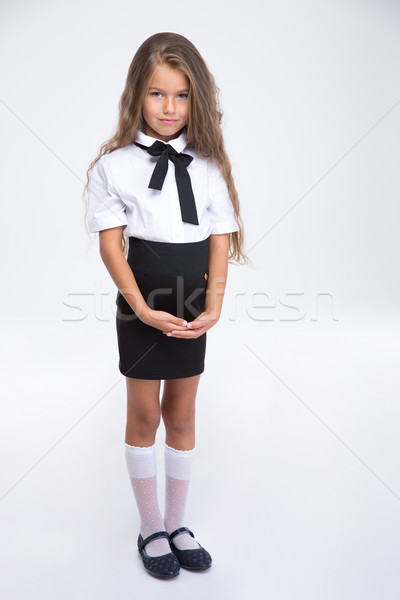 Portret piękna mały uczennica stałego Zdjęcia stock © deandrobot