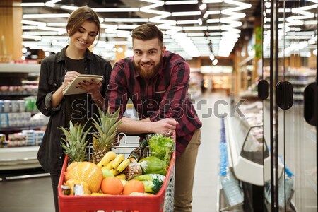 愛 情侶 超級市場 購物車 圖像 年輕 商業照片 © deandrobot