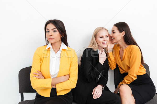 Sério mulher sessão feliz colegas mulheres Foto stock © deandrobot