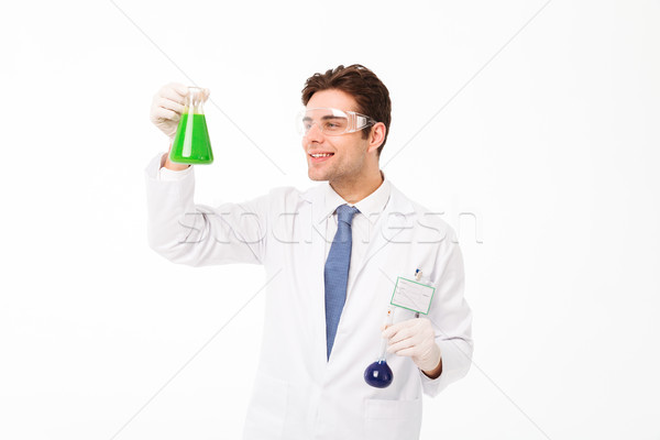 Portrait of a happy young male scientist Stock photo © deandrobot