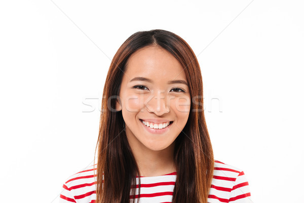 Close up portrait of a cheerful young asian girl Stock photo © deandrobot