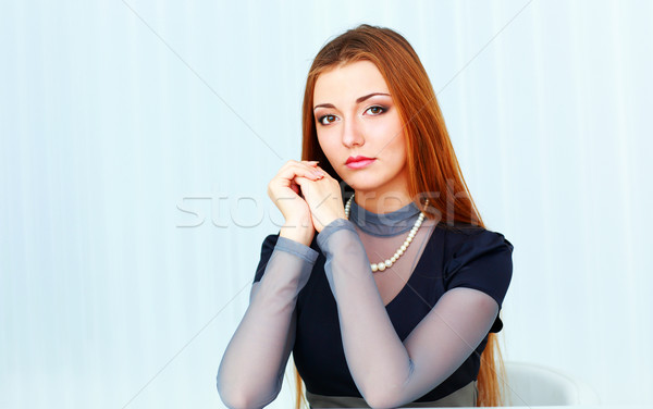 Jeunes belle femme séance table [[stock_photo]] © deandrobot