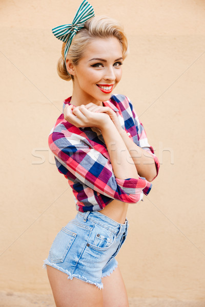 довольно Cute pinup девушки рубашку Сток-фото © deandrobot