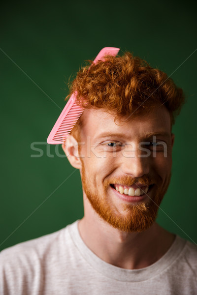 Retrato jovem homem rosa escova de cabelo Foto stock © deandrobot
