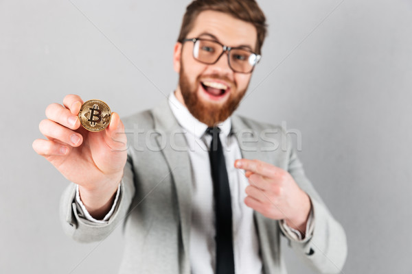 Close up portrait of a happy businessman Stock photo © deandrobot