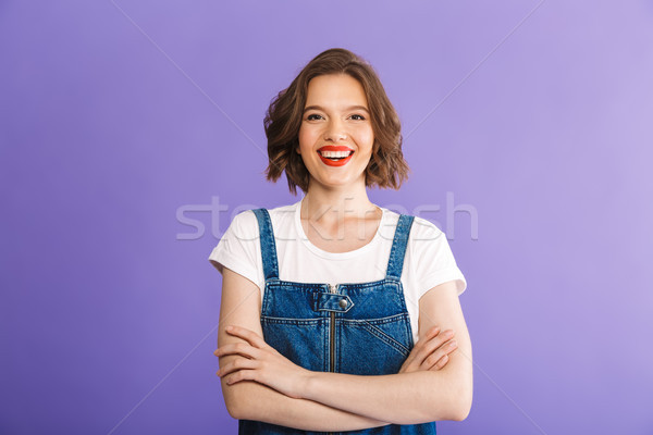 Stockfoto: Portret · vrolijk · jonge · vrouw · denim · kleding · permanente