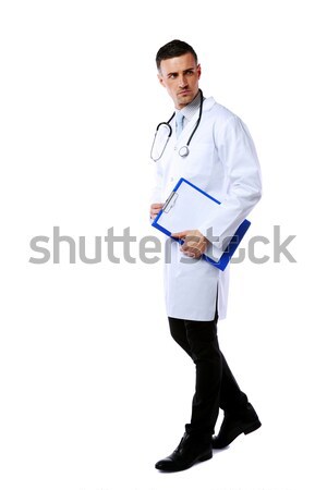 ストックフォト: 肖像 · 男性医師 · 白 · 紙 · 作業 · 医療