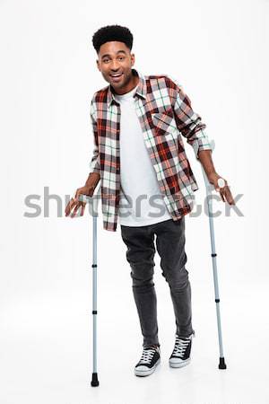 Full length portrait of dissatisfied man over white background Stock photo © deandrobot